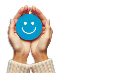 A pair of hands gently holding a blue circle with a simple, happy face drawn on it on white background