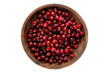 Red craneberry in wooden plate isolated on transparent background