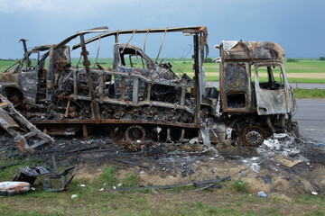 Burnt truck with a burnt-out driver's cab, accident.