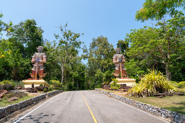 The door keeper of Wat Phra Mahathat Chedi Phakdi Prakat, a beautiful temple near the sea in Prachuap Khiri Khan Province.
