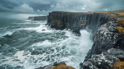 Obraz premium Dramatic Cliffs and Crashing Waves on a Stormy Day