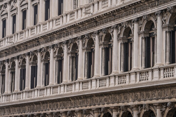 Fototapeta premium The long Arcade, known as the Procuratie Vecchie on the north side of St Mark's Square, piazzetta facade - Doges palace in Venice, Italy 04.01.2024