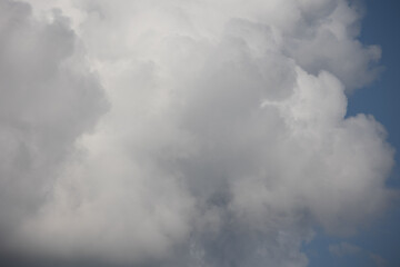 Blue sky. Beautiful Cumulus clouds flying across the sky,