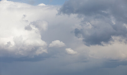 Blue sky. Beautiful Cumulus clouds flying across the sky,