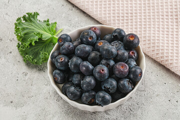 Sweet ripe blueberry on the bowl