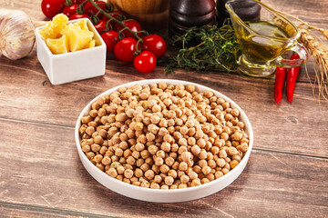 Dry chickpea seeds heap in the bowl