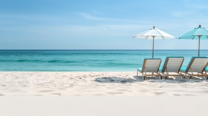 Fototapeta premium Relaxing beach scene featuring modern lounge chairs and bright umbrellas, white sand and turquoise water, ideal for a peaceful vacation day, picturesque and calm