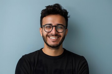 Fototapeta premium Smiling jewish Man in Glasses Poses for Studio Photos