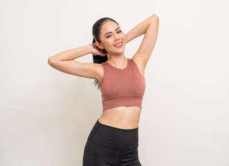Young beautiful smiling asian woman with sportswear on isolated white background. Portrait happy healthy slim fit and firm latin attractive sporty woman standing pose exercise workout in studio.