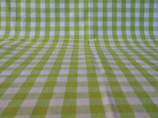 green and white chequered fabric texture background