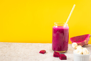 dragon fruit smoothie with yellow background. Perfect for recipe, article, or any cooking contents.