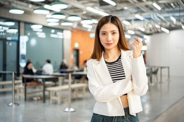 Young asian business woman with standing and pose working in the office. Portrait Start up freelancer people posing while working in the modern office. Lifestyle business female.