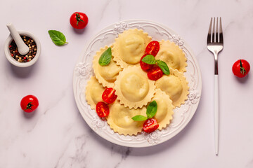Ravioli with tomato sauce and basil
