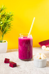 dragon fruit smoothie with yellow background. Perfect for recipe, article, or any cooking contents.