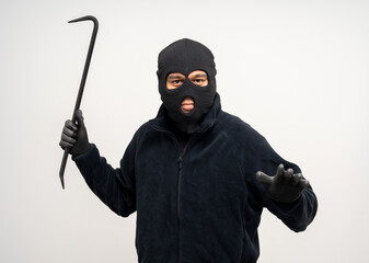 Thief in uniform black jacket various pose on isolated background. The Robber terrorism criminal...