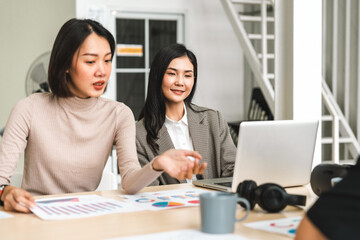 Asian business start up freelance people team analyzing statistics financial. Group Team of businesspeople man and woman Meeting Conference Discussion various topic Corporate Concept in office.