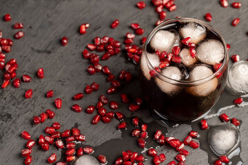 cold pomegranate seed juice with chunks of ice