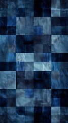 Digital artwork of a quilt-like patchwork texture with varying shades of blue and abstract design