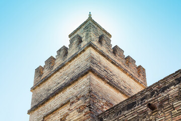 Ancient fortress. Detail of a medieval castle tower.