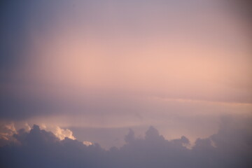 beautiful cloudy sunset creating pink and orange clouds.