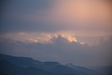 beautiful cloudy sunset creating pink and orange clouds.