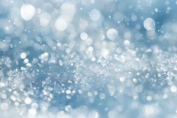 Fototapeta premium Beautiful Snowfall Background - Soft Focus Crystal Drops on a Blue Blurred Surface