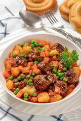 turkish meatball stew, sulu kofte, in a bowl