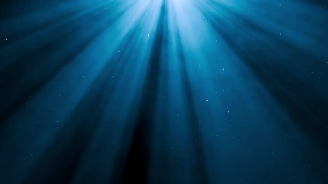 Light rays from top with floating flying glitter particles in air mist or steam, overlay special vfx ambient effect animation for atmospheric videos or underwater scenes. Stage spot light effect. 