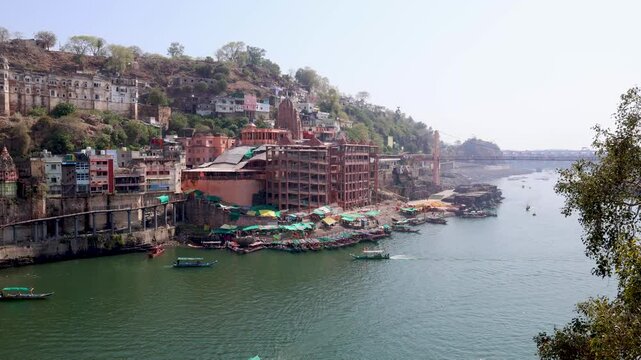 ancient hindu pilgrimage temple at holy river bank aerial view at morning from unique perspective