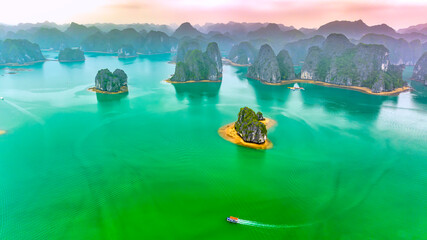 Rock island in Lan Ha bay, Vietnam, Southeast Asia. UNESCO World Heritage Site. Popular landmark,...