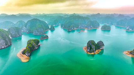 Rock island in Lan Ha bay, Vietnam, Southeast Asia. UNESCO World Heritage Site. Popular landmark,...