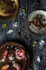 Small plates on blackboard texture. Food backdrop.