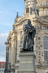 Fototapeta premium Monument to the reformer Martin Luther in front of the Frauenkirche in Dresden