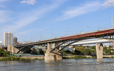 Novosibirsk, Novosibirsk region, Russian Federation - June 01 2024. Novosibirsk metro bridge and Oktyabrsky bridge