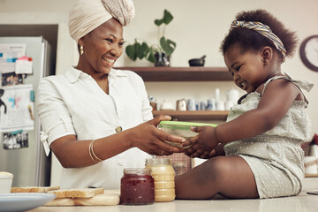 Food, love or mother and baby in a kitchen for sandwich, learning and bonding with organic peanut butter in their home together. Black family, support brunch or mom and daughter with bread meal prep