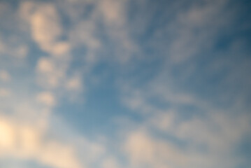 Blurred background of cloudy sky in the late afternoon