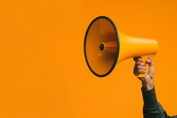 Vocal Megaphone: Hand Holding Large Yellow Bullhorn