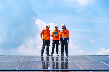 Technician team checks the maintenance of the solar panels on the roof, Sustainable energy industry concept, Renewable energy solution for climate change