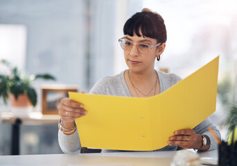 Office, reading and business woman with files for administration, human resources and paperwork....