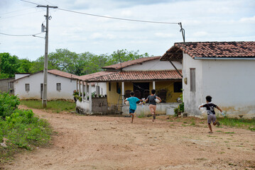 children running, boys running, rural landscape, countryside city, Brazil, northeastern Brazil,children playing, happy children , country life