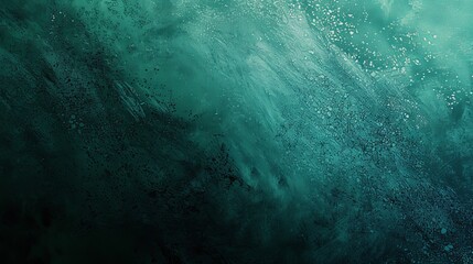 A captivating underwater abstract scene that doubles as a wallpaper, showcasing a deep teal texture that creates an enigmatic and tranquil background