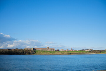 Fototapeta premium South Shields UK: 22nd Feb 2024:A view of the North Shields skyline across the River Tyne, taken from South Shields on a clear, sunny day.
