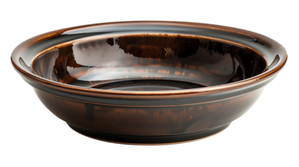 Large, round, brown bowl. The bowl is made of ceramic and has a smooth, glossy finish. isolate on white background