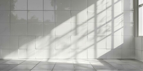 Obraz premium White tile wall background with marble table top, window light shadow for product display mockup or design interior concept of modern kitchen, bathroom and bedroom.
