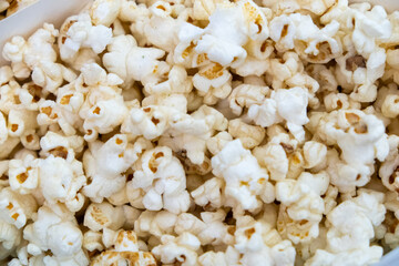 Close-up view of popcorn, for food-related contents, snacks, or movie night