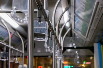 Fototapeta premium Interior view of the bus with hand grip, in Bangkok, Thailand