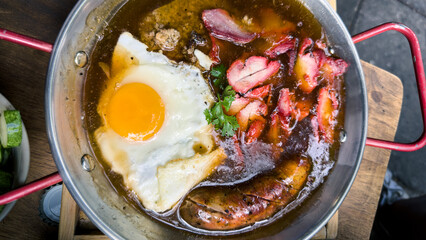 Plate of stew, Vietnamese pork meat, sausage, and egg. Traditional dish Vietnam
