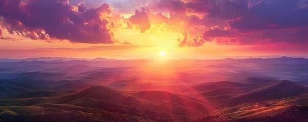 A breathtaking sunset over a vast expanse of rolling hills, painting the sky with hues of gold, orange, and purple.