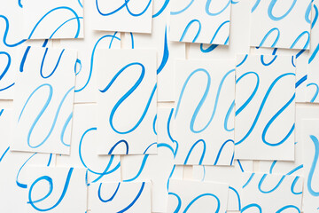 blank cards with micro perforated edges and wavy lines in blue