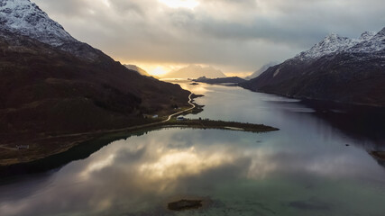 Sunset on rocky and peaks and sea, Reine, Nordland county, Lofoten Islands, Arctic, Northern Norway, Scandinavia, Europe